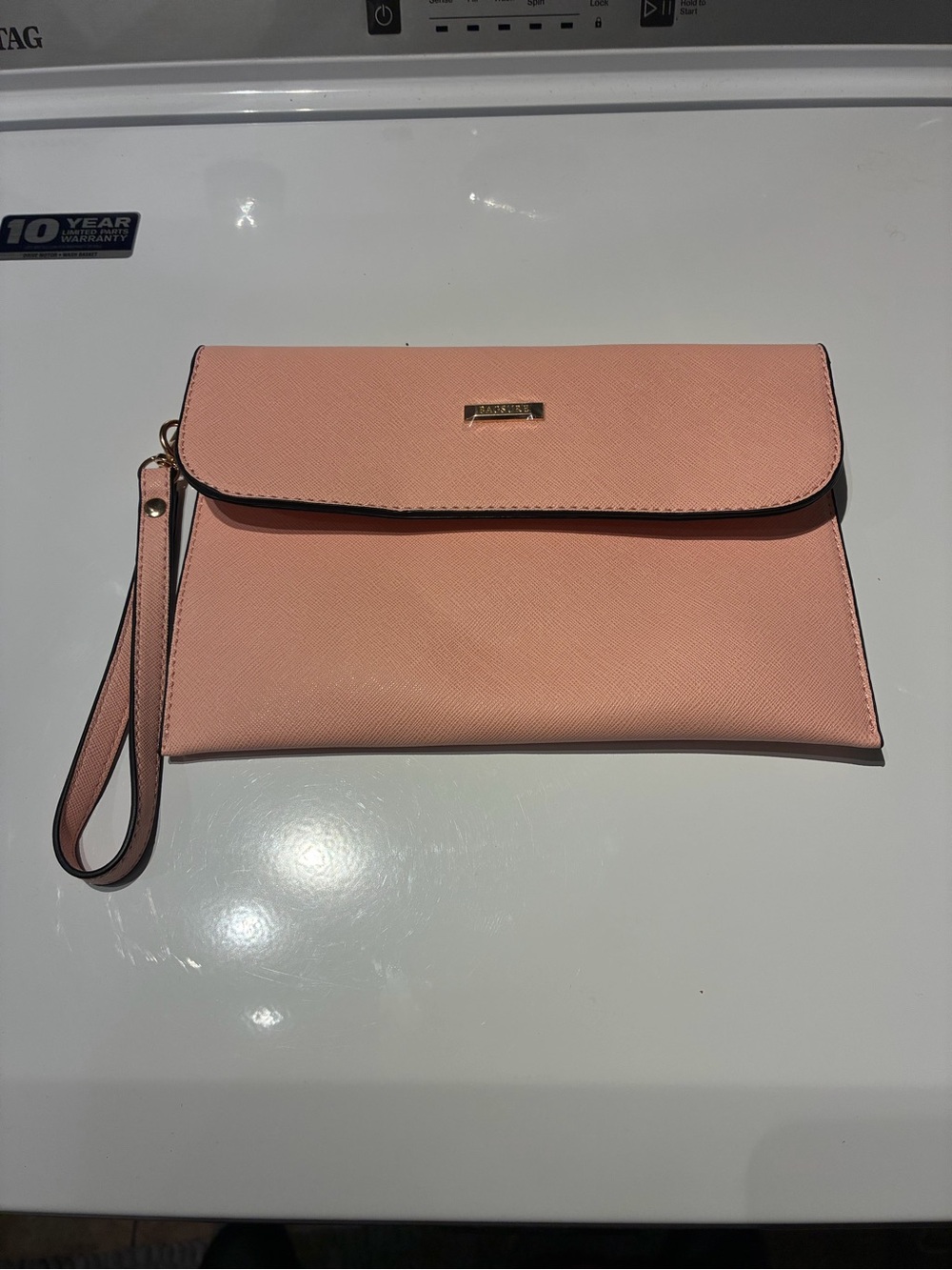 Elegant Peach Wristlet Clutch with Gold Accent Plate